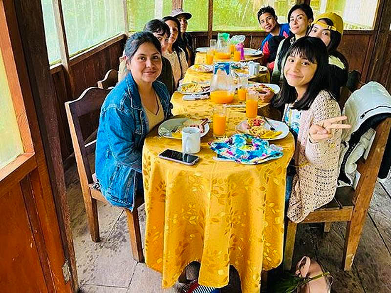 Tourist having lunch at the dinning room of Antares Amazon Lodge
